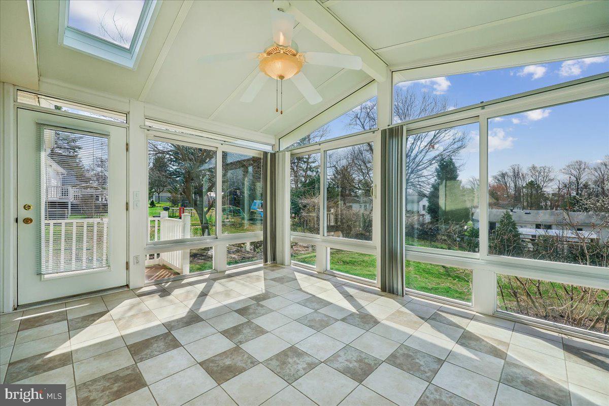 11924 Fernshire Road Gaithersburg, MD 20878 - Photo 35 of 74 Bright sunroom with scenic views.
