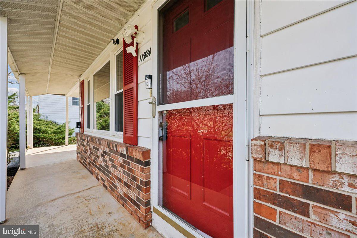 11924 Fernshire Road Gaithersburg, MD 20878 - Photo 50 of 74 Charming entry with vibrant red door.