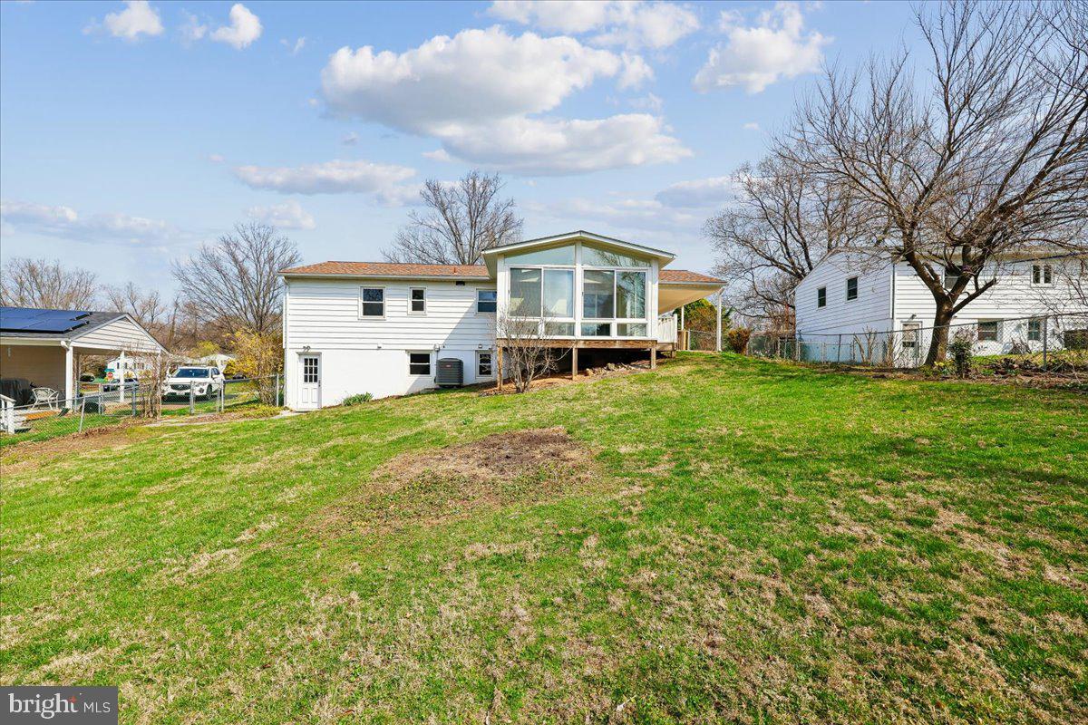 11924 Fernshire Road Gaithersburg, MD 20878 - Photo 53 of 74 a front view of a house with a yard