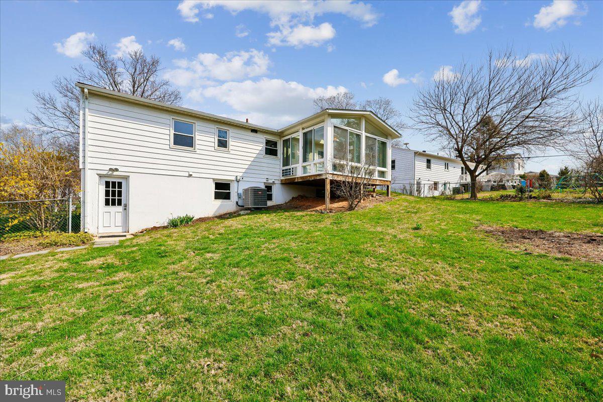 11924 Fernshire Road Gaithersburg, MD 20878 - Photo 54 of 74 a front view of a house with a yard