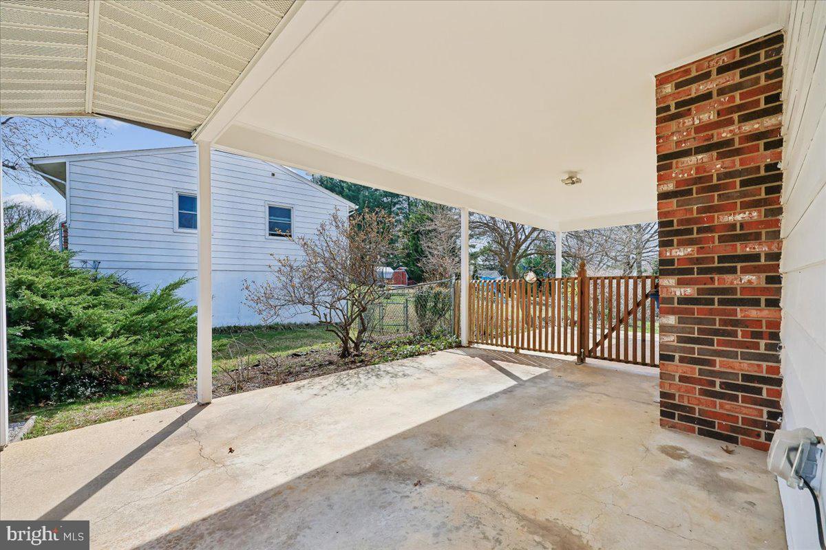 11924 Fernshire Road Gaithersburg, MD 20878 - Photo 65 of 74 Inviting outdoor space with charm.