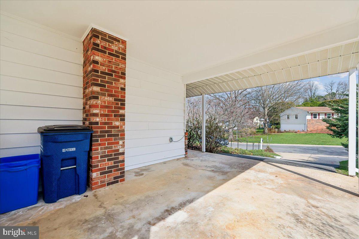 11924 Fernshire Road Gaithersburg, MD 20878 - Photo 68 of 74 Spacious carport with charming details.