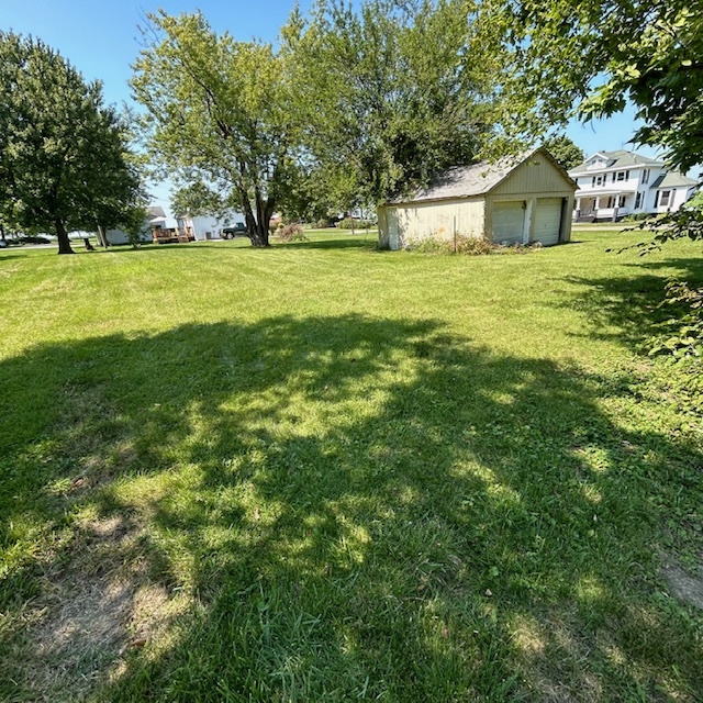 11629 Oak Street Downs, IL 61736 - Photo 2 of 6 a big yard with large trees and plants