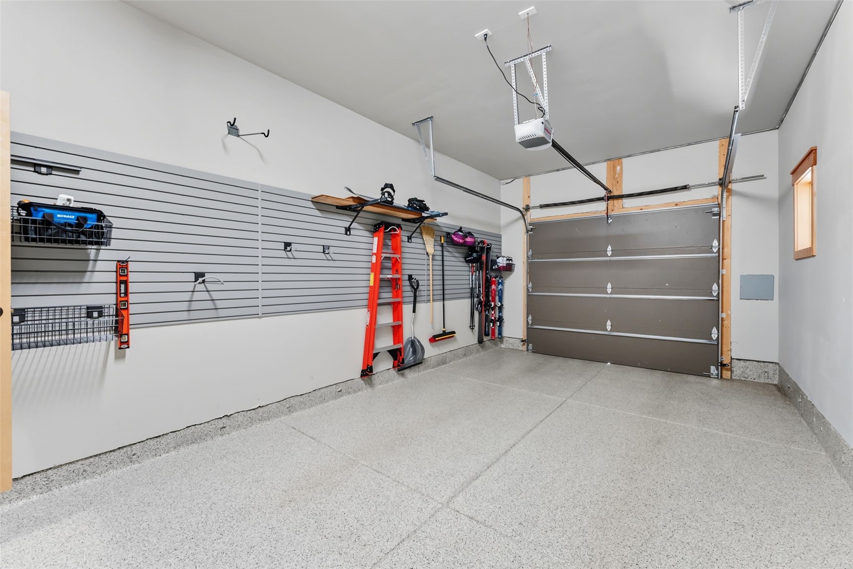 736 Independence Road, Unit 4B Keystone, CO 80435 - Photo 31 of 39 Garage offers epoxy floors and storage solutions