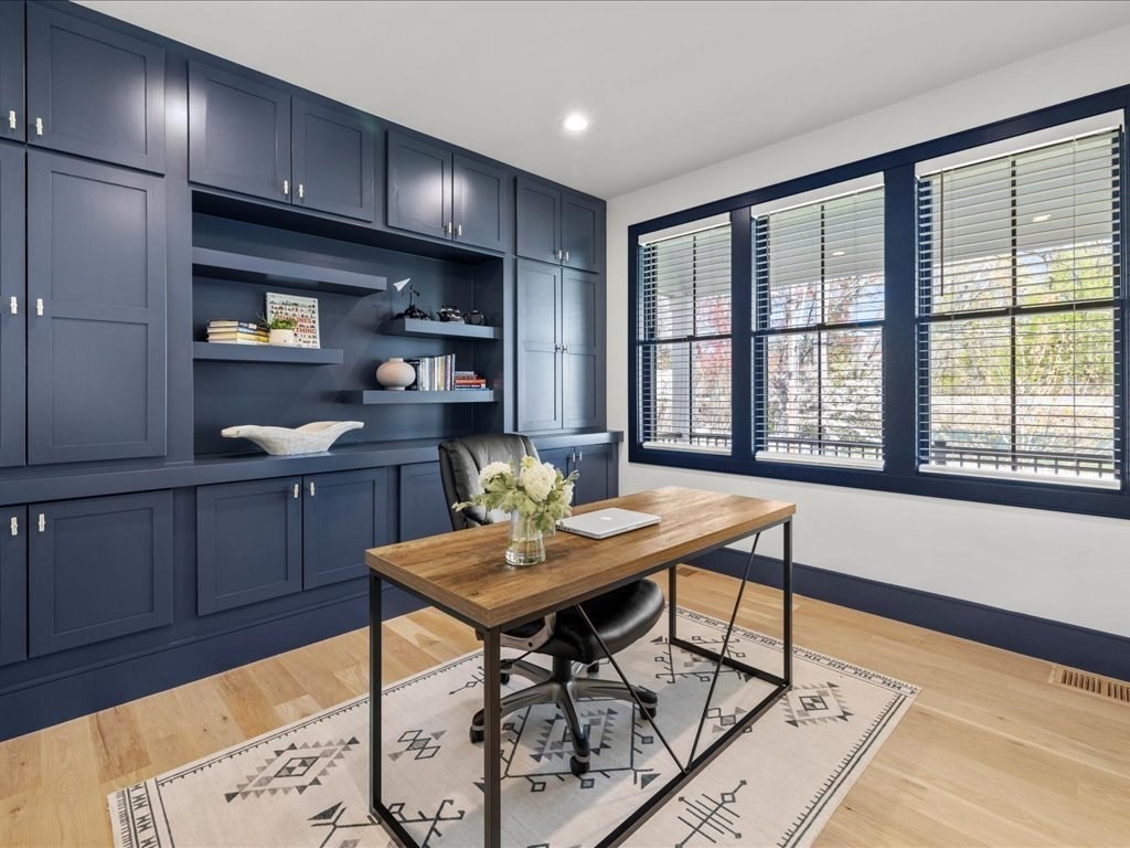 90 Norfolk Street Needham, MA 02492 - Photo 18 of 42 a workspace with furniture window and wooden floor