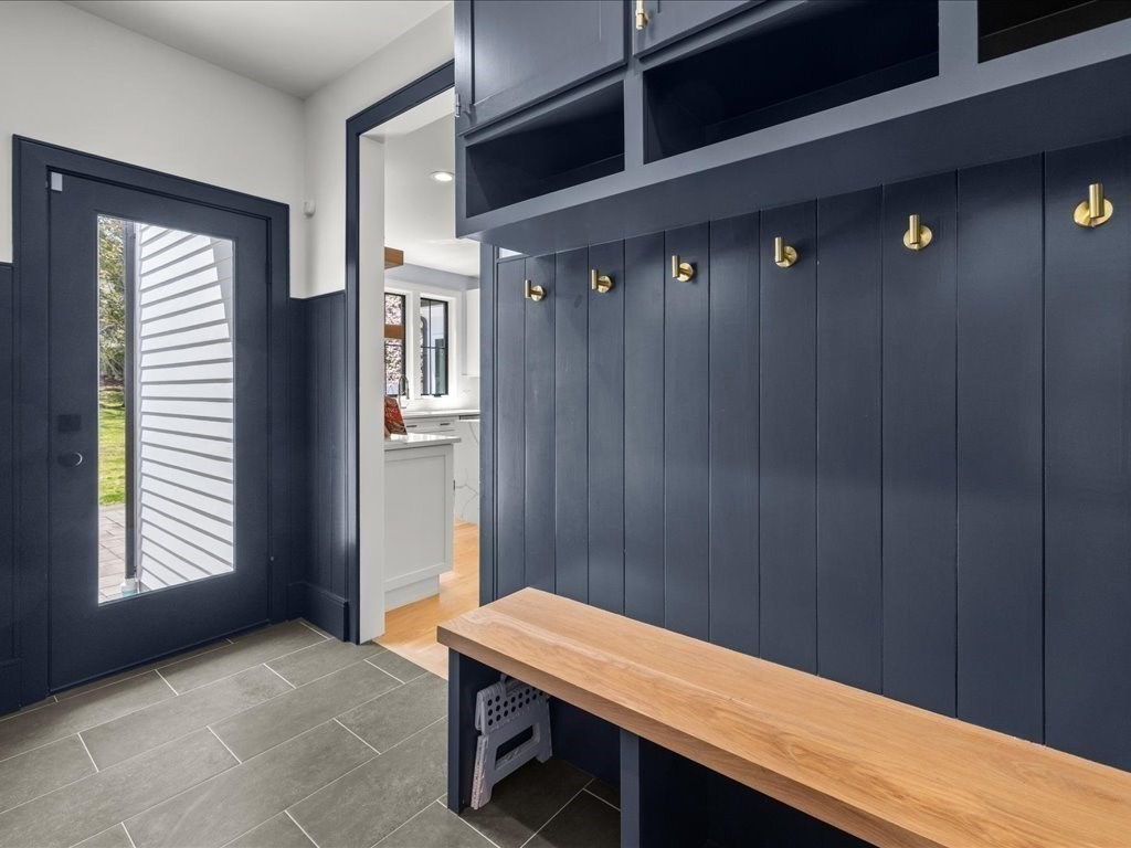 90 Norfolk Street Needham, MA 02492 - Photo 22 of 42 a room with a table and a window