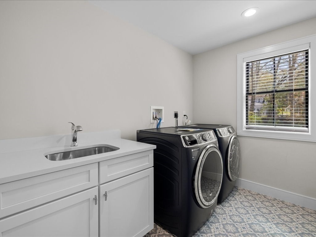 90 Norfolk Street Needham, MA 02492 - Photo 33 of 42 a utility room with dryer and washer