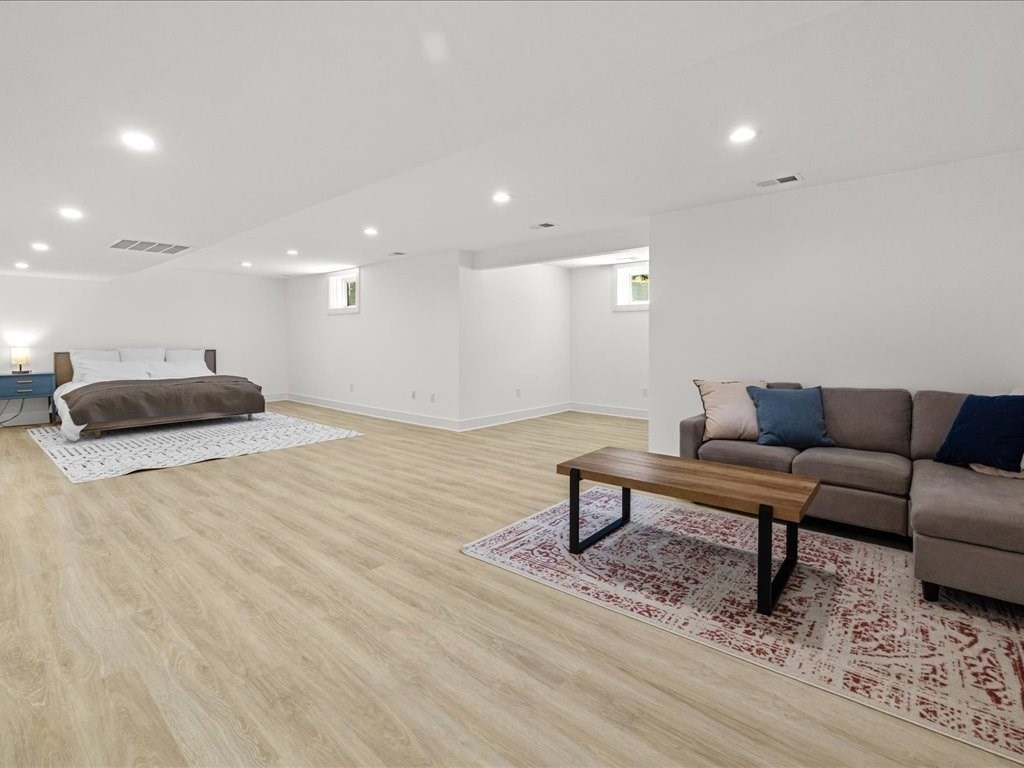 90 Norfolk Street Needham, MA 02492 - Photo 36 of 42 a living room with furniture and a wooden floor