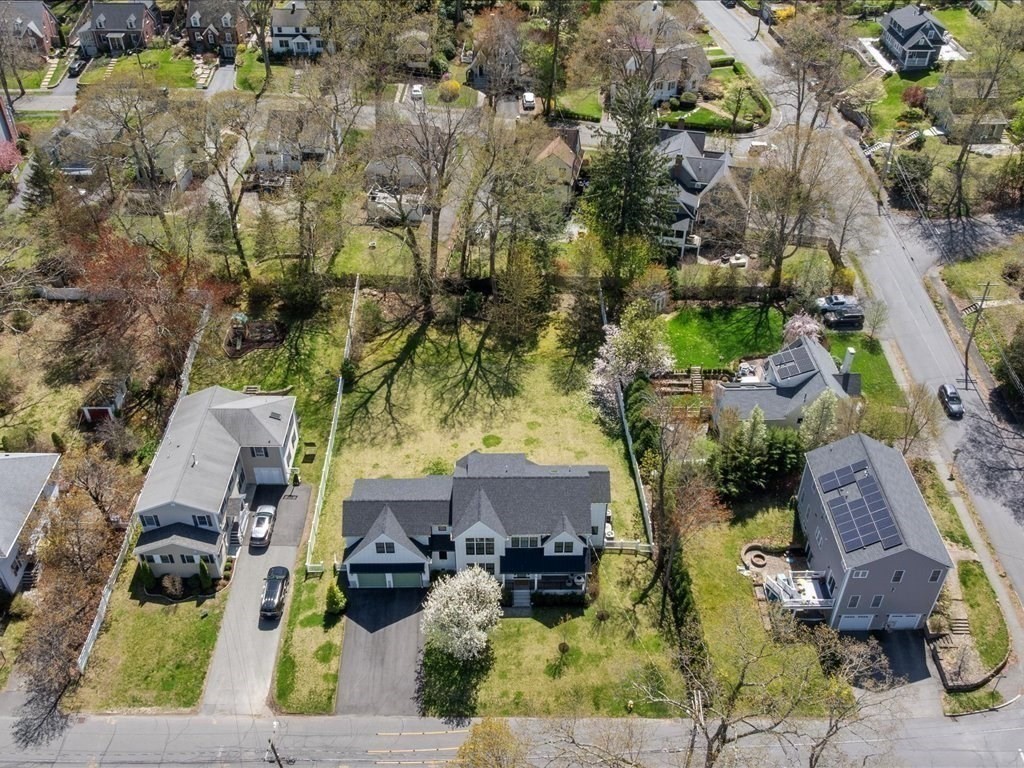 90 Norfolk Street Needham, MA 02492 - Photo 4 of 42 an aerial view of residential houses with outdoor space