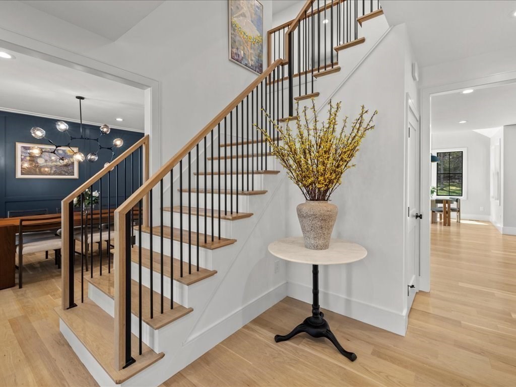 90 Norfolk Street Needham, MA 02492 - Photo 6 of 42 a view of entryway and hall with wooden floor