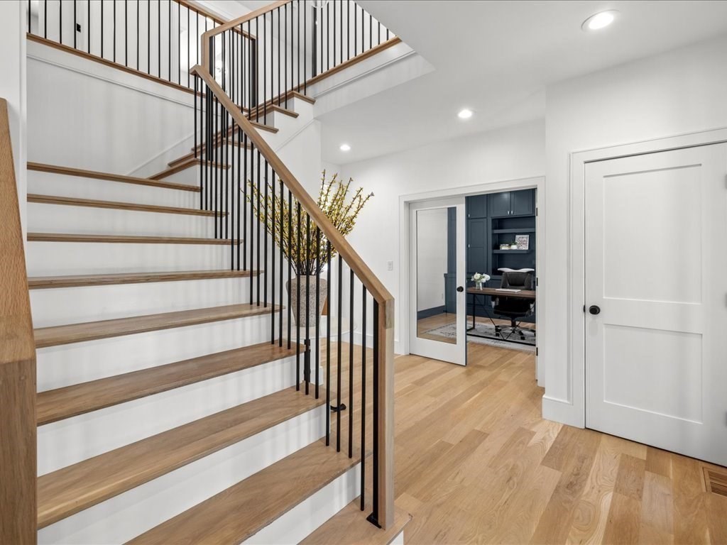 90 Norfolk Street Needham, MA 02492 - Photo 7 of 42 a view of entryway and hall with wooden floor