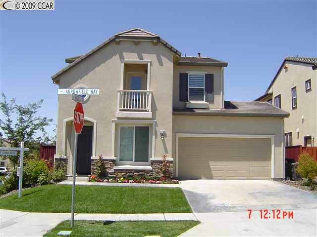 1186 Arrowfield Way San Ramon, CA 94582 - Photo 1 of 1 a front view of a house with a yard