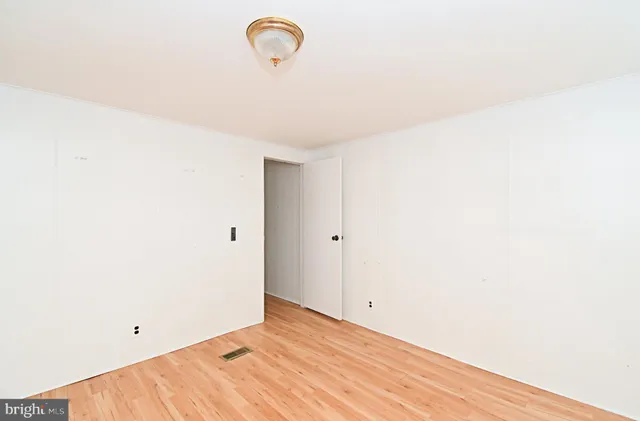 a view of a room with a fan