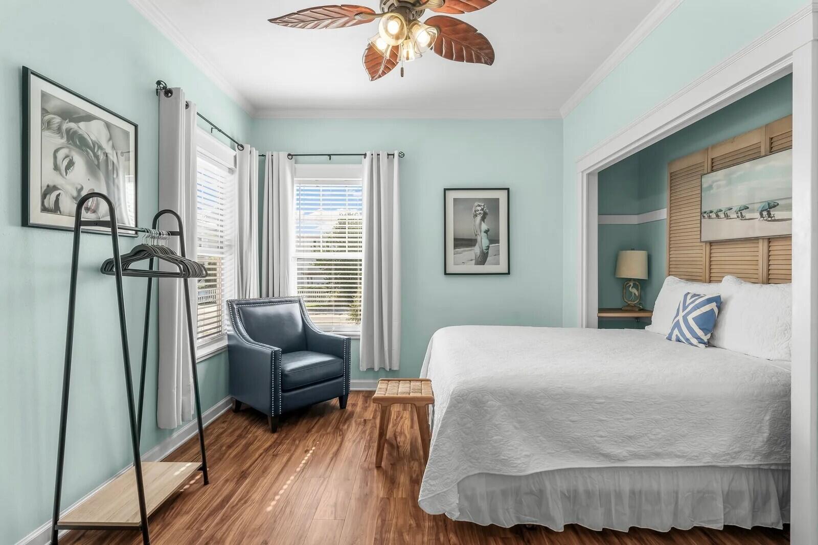 4503 John Avenue Destin, FL 32541 - Photo 15 of 51 a bedroom with a bed couch and a window