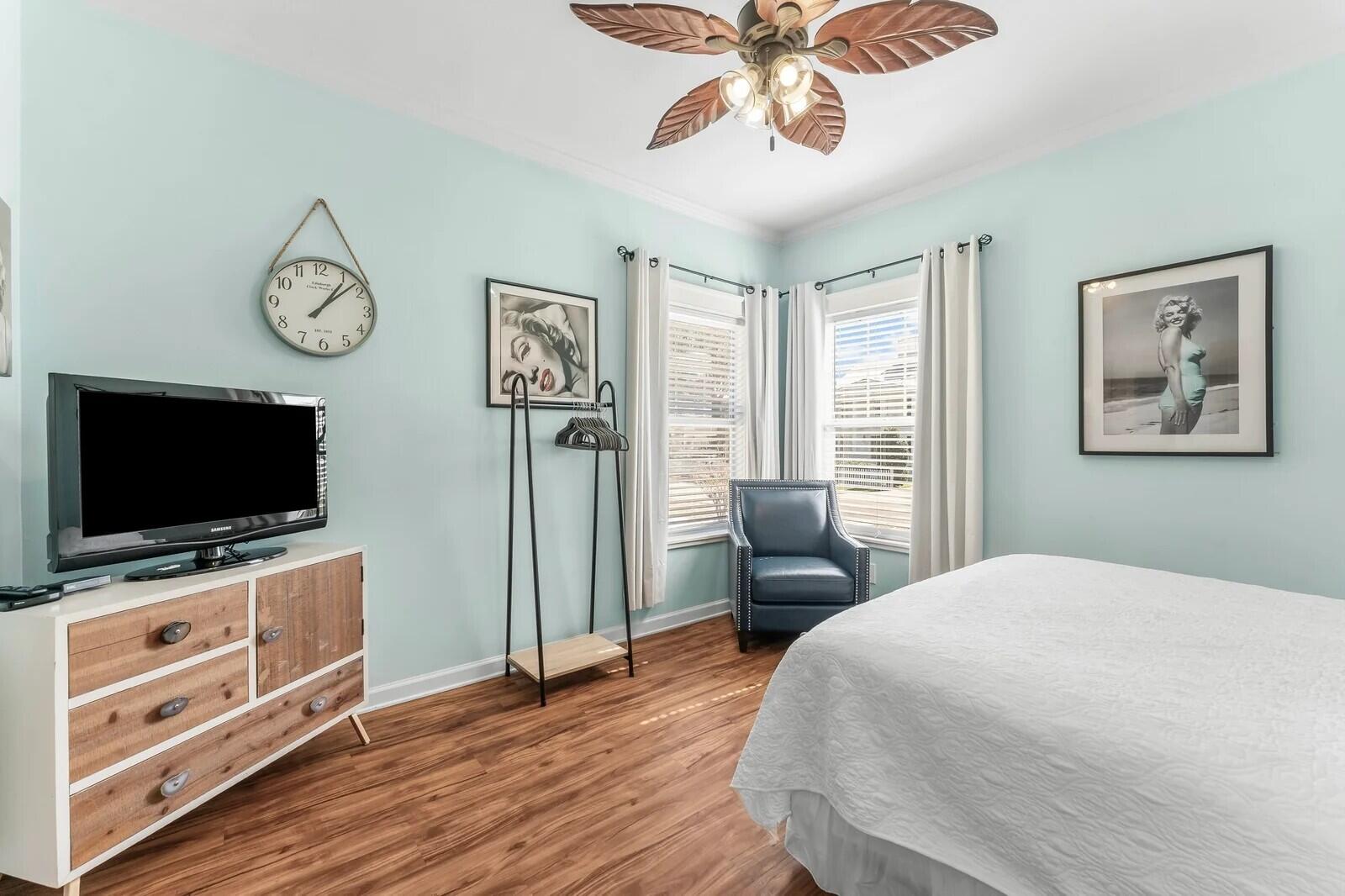 4503 John Avenue Destin, FL 32541 - Photo 17 of 51 a bedroom with furniture and a flat screen tv