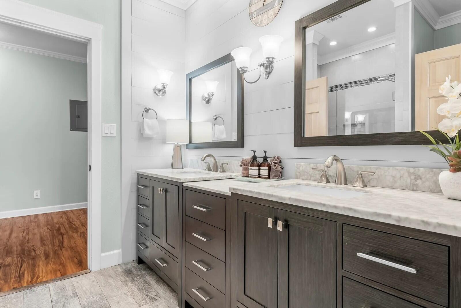 4503 John Avenue Destin, FL 32541 - Photo 19 of 51 a bathroom with a granite countertop sink double vanity and a mirror