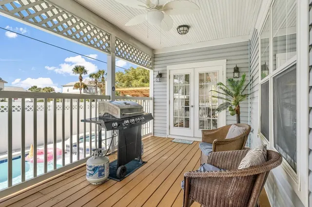 a view of a patio with furniture