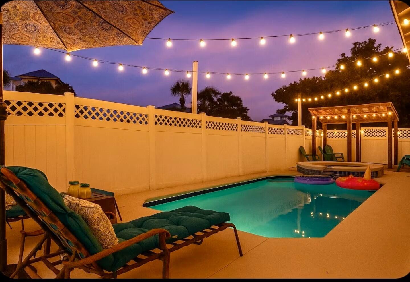 4503 John Avenue Destin, FL 32541 - Photo 38 of 51 a view of a swimming pool with a yard