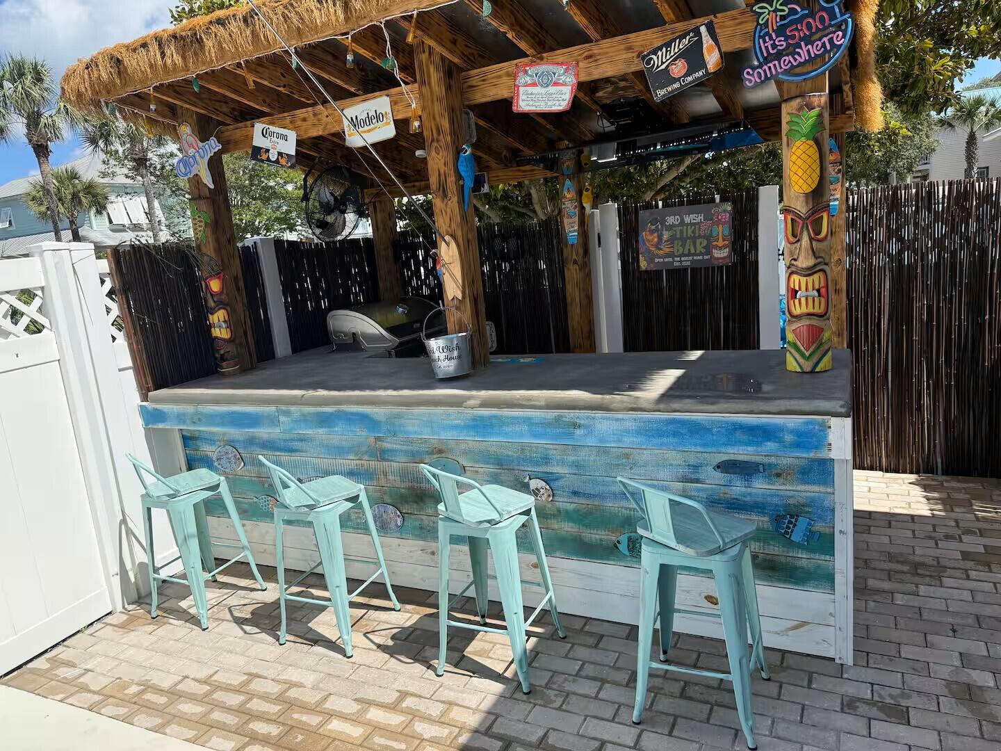 4503 John Avenue Destin, FL 32541 - Photo 39 of 51 a view of a chairs and table in the patio