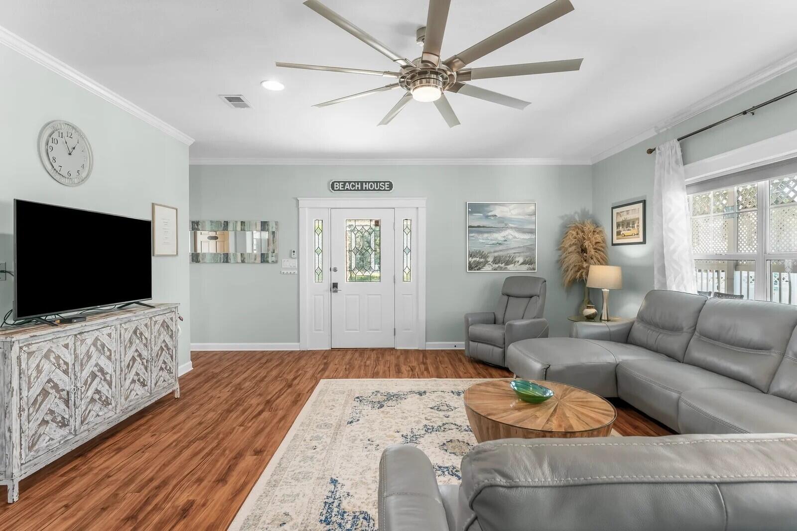 4503 John Avenue Destin, FL 32541 - Photo 5 of 51 a living room with furniture and a flat screen tv