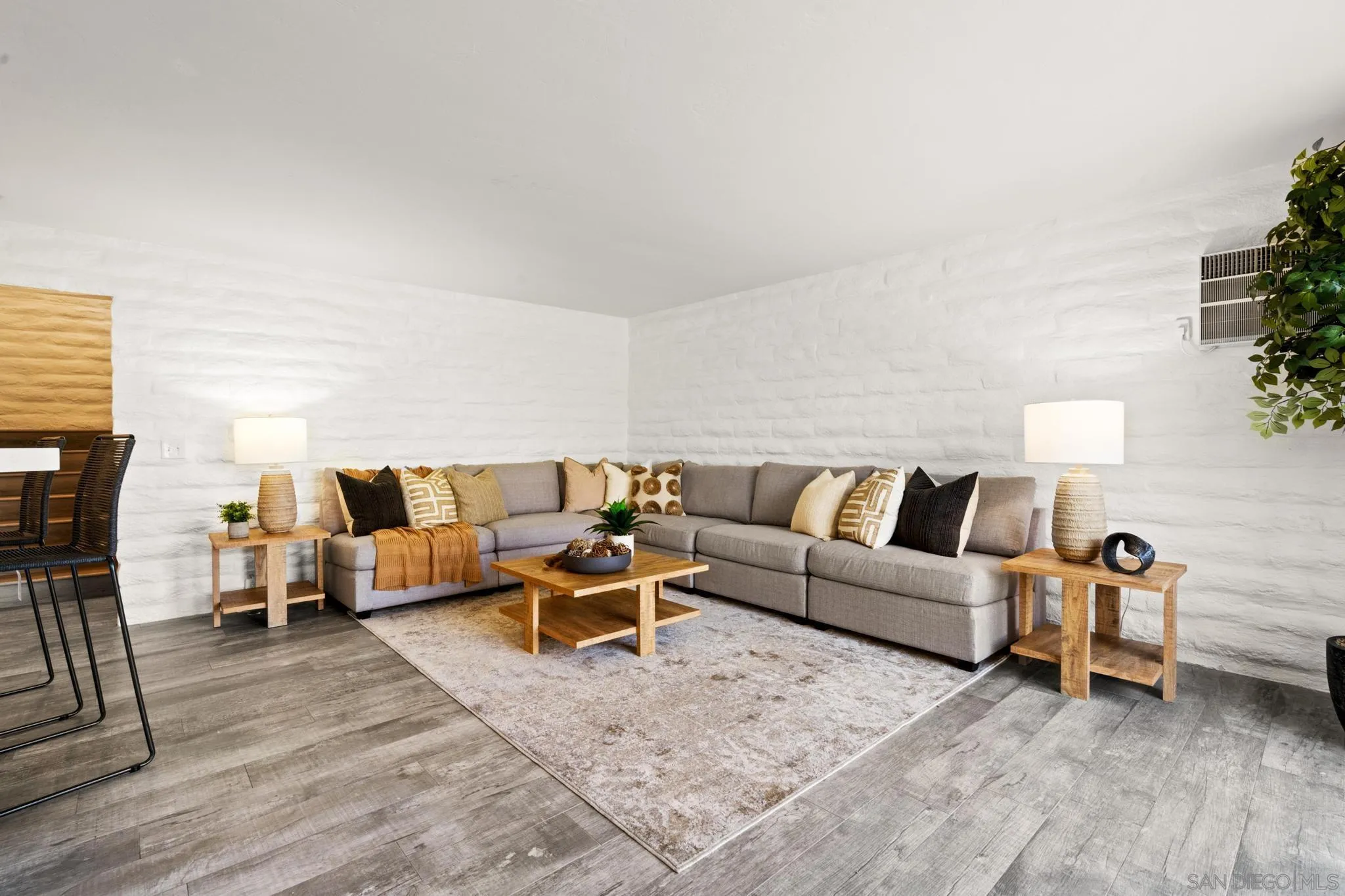 2544 Navarra Drive, Unit 17 Carlsbad, CA 92009 - Photo 12 of 24 a living room with furniture and a couch