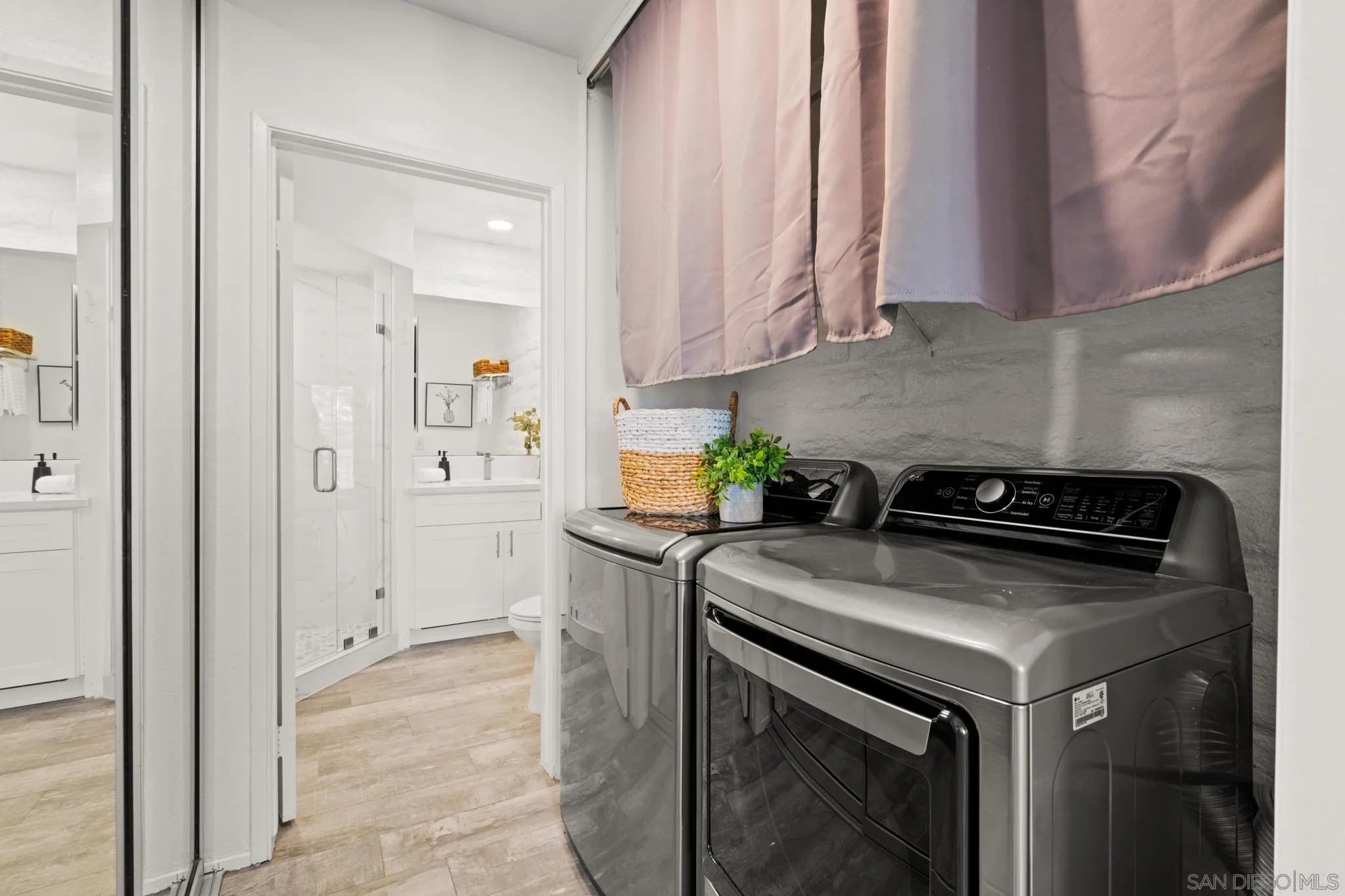 2544 Navarra Drive, Unit 17 Carlsbad, CA 92009 - Photo 20 of 24 a kitchen with stainless steel appliances granite countertop a stove and a refrigerator