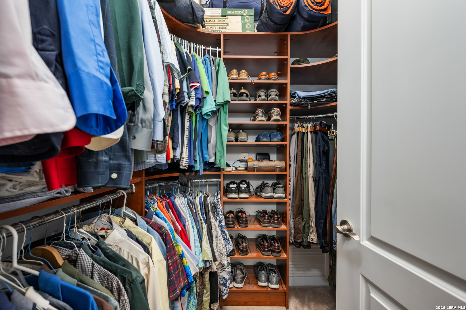 613 Saxet Trail Spring Branch, TX 78070 - Photo 27 of 50 a view of walk in closet with clothes and shoes