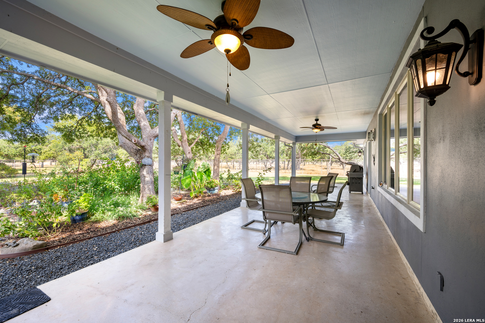 613 Saxet Trail Spring Branch, TX 78070 - Photo 48 of 50 a view of a dining room with furniture window and outside view