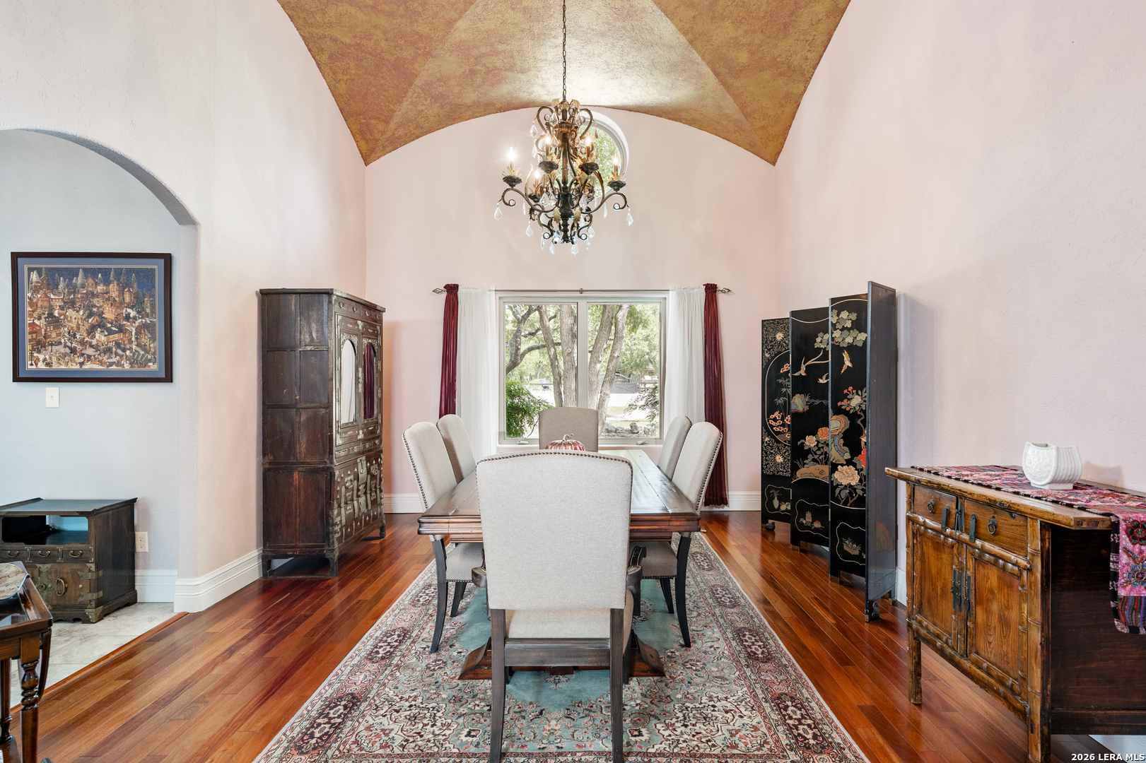 613 Saxet Trail Spring Branch, TX 78070 - Photo 6 of 50 a dining room with furniture a chandelier and wooden floor