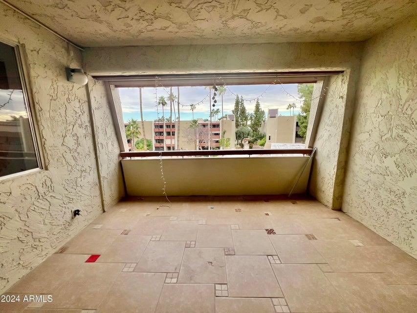 7625 East Camelback Road, Unit 415A Scottsdale, AZ 85251 - Photo 16 of 17 a view of room with window and front door