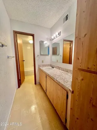 a view of a big room with closet and cabinet