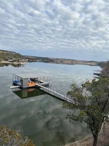 a view of a yard with trees