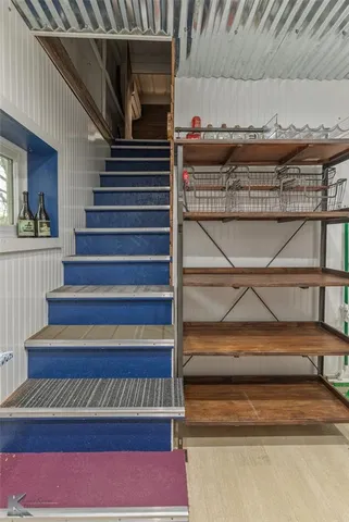 a bathroom with a sink vanity and a mirror