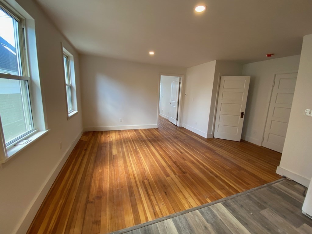 23 Main Street, Unit 2 Topsfield, MA 01983 - Photo 8 of 16 a view of wooden floor in a room