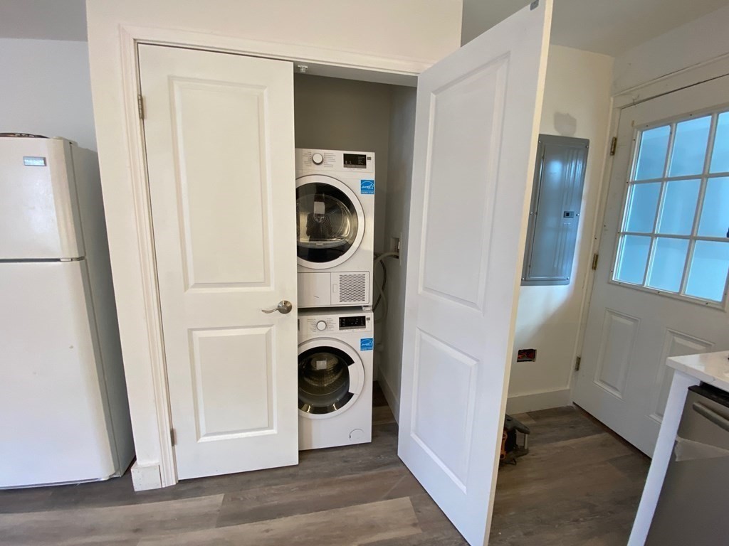 23 Main Street, Unit 2 Topsfield, MA 01983 - Photo 9 of 16 a utility room with dryer and washer