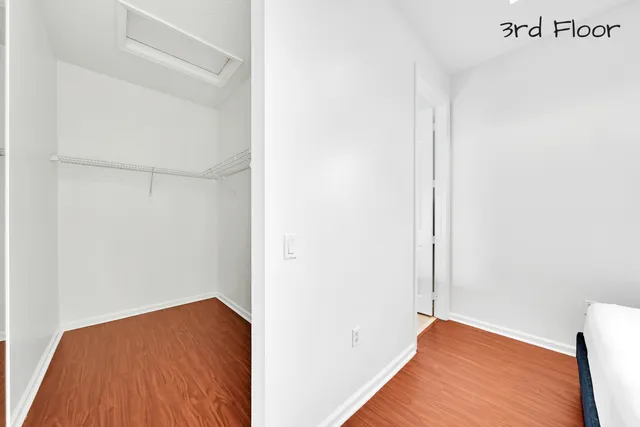 an aerial view of residential houses with outdoor space and swimming pool