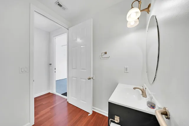 a view of a room with lots of racks on the wall