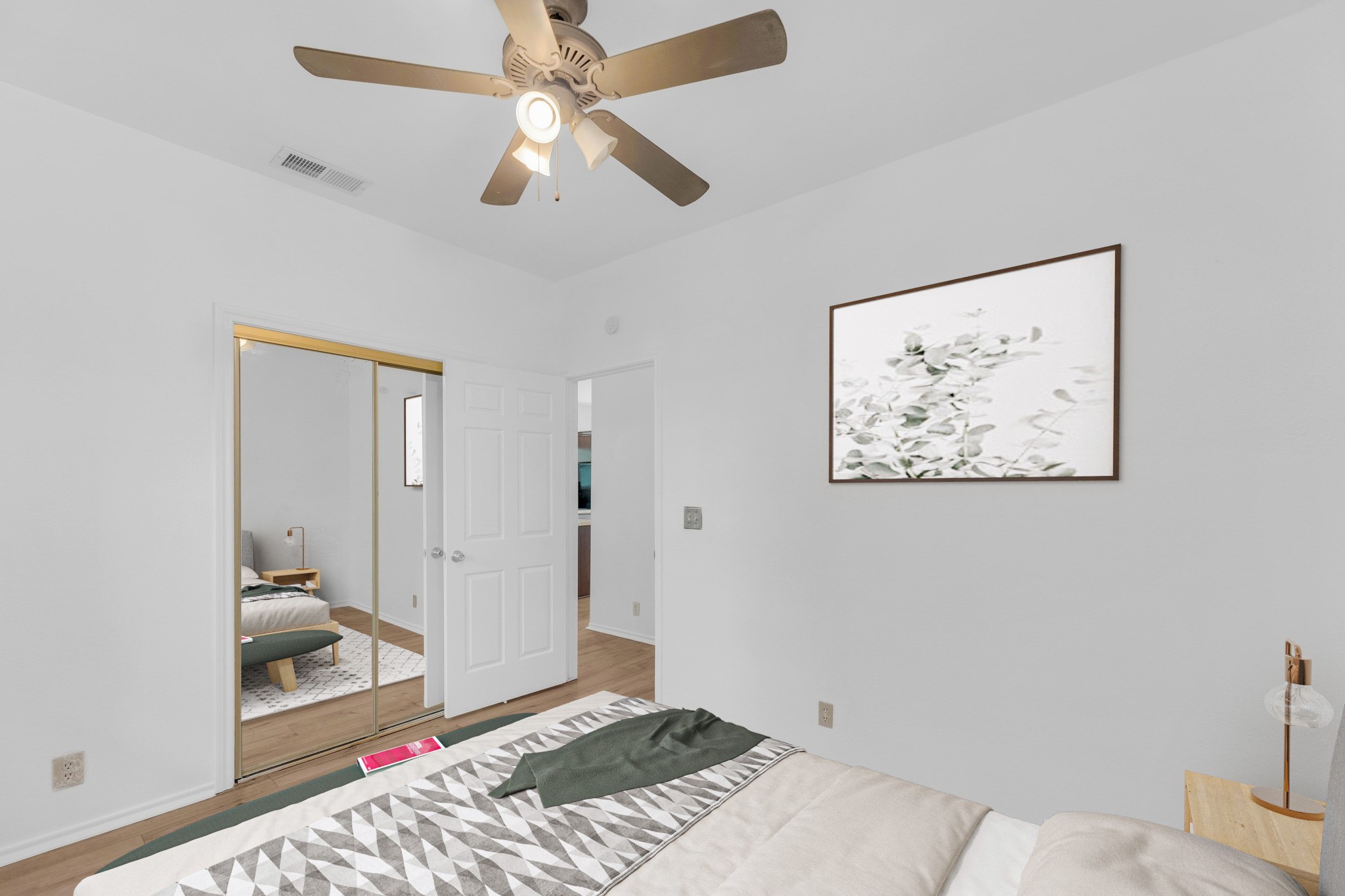 2414 Longview Street, Unit 101 Austin, TX 78705 - Photo 23 of 31 a bedroom with a bed and glass door