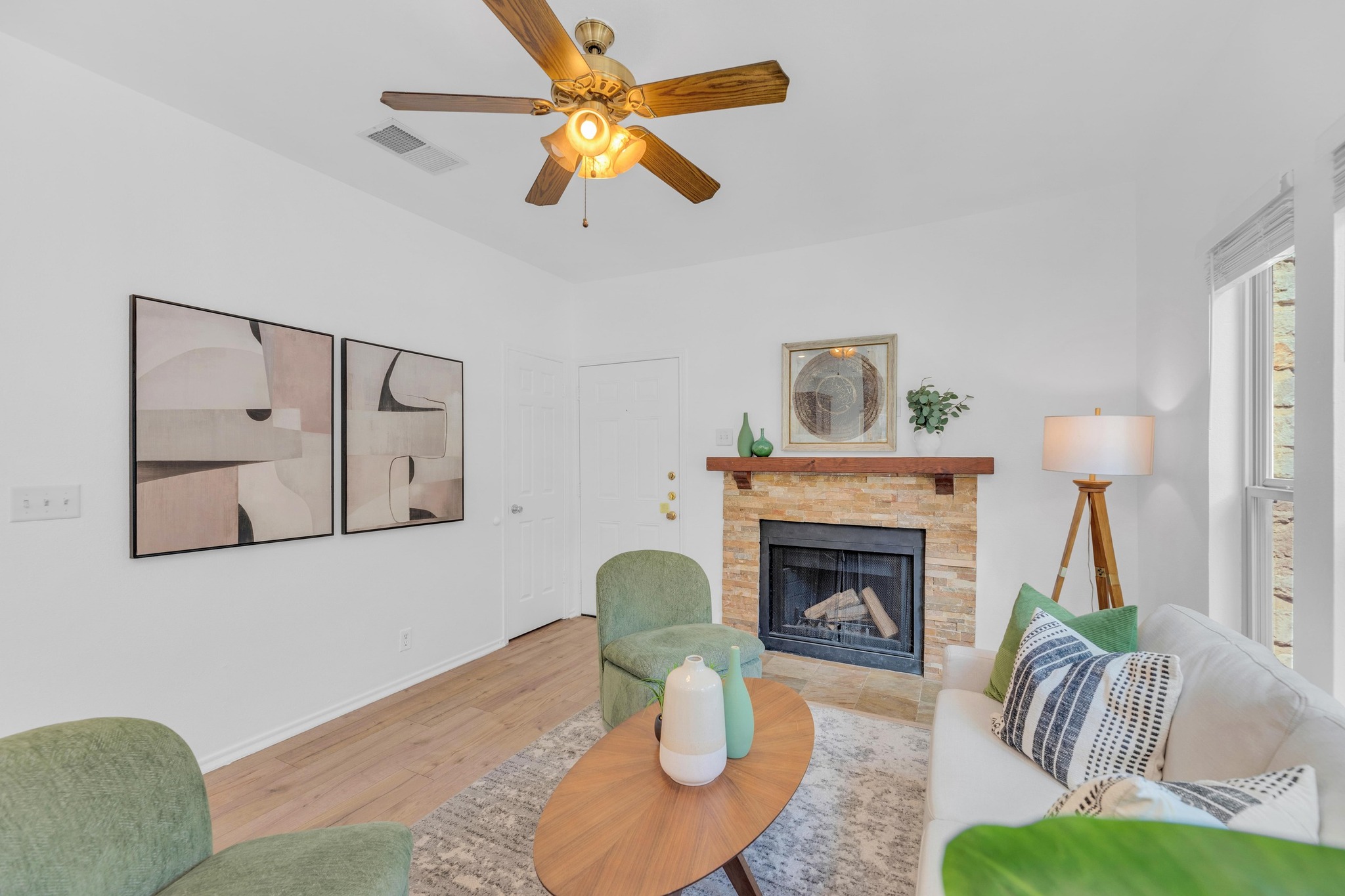 2414 Longview Street, Unit 101 Austin, TX 78705 - Photo 5 of 31 a living room with furniture and a fireplace
