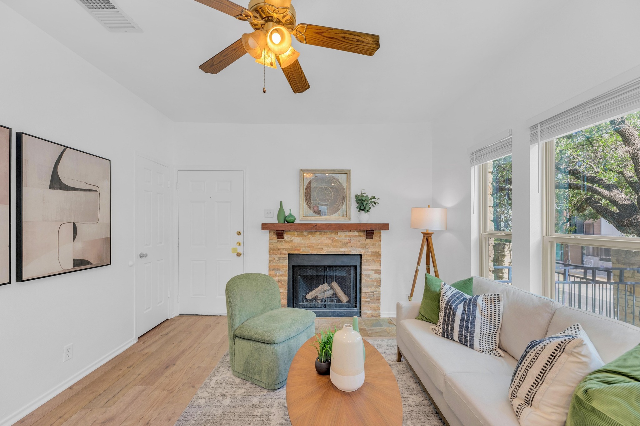 2414 Longview Street, Unit 101 Austin, TX 78705 - Photo 6 of 31 a living room with furniture and a fireplace
