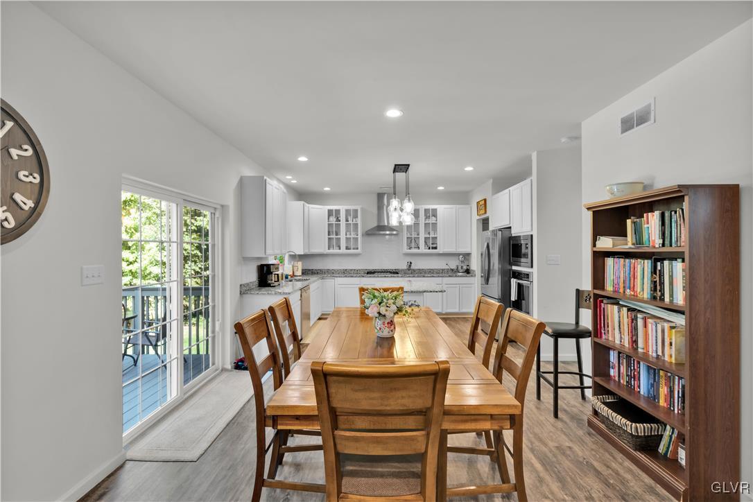 152 Corktree Road Kunkletown, PA 18058 - Photo 12 of 49 a dining room with furniture and a book shelf