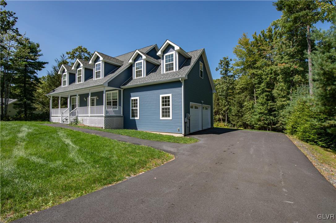 152 Corktree Road Kunkletown, PA 18058 - Photo 2 of 49 a front view of a house with garden