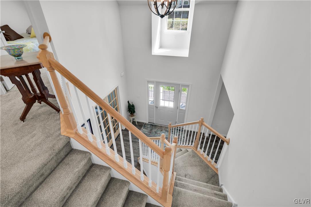 152 Corktree Road Kunkletown, PA 18058 - Photo 23 of 49 a view of entryway with wooden floor and stairs