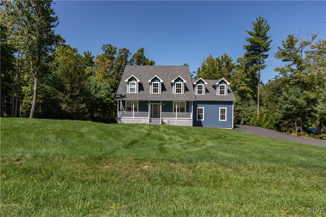 152 Corktree Road Kunkletown, PA 18058 - Photo 3 of 49 a front view of a house with a garden