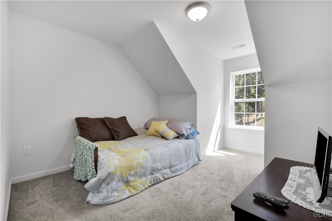 152 Corktree Road Kunkletown, PA 18058 - Photo 32 of 49 a bedroom with a bed and a window