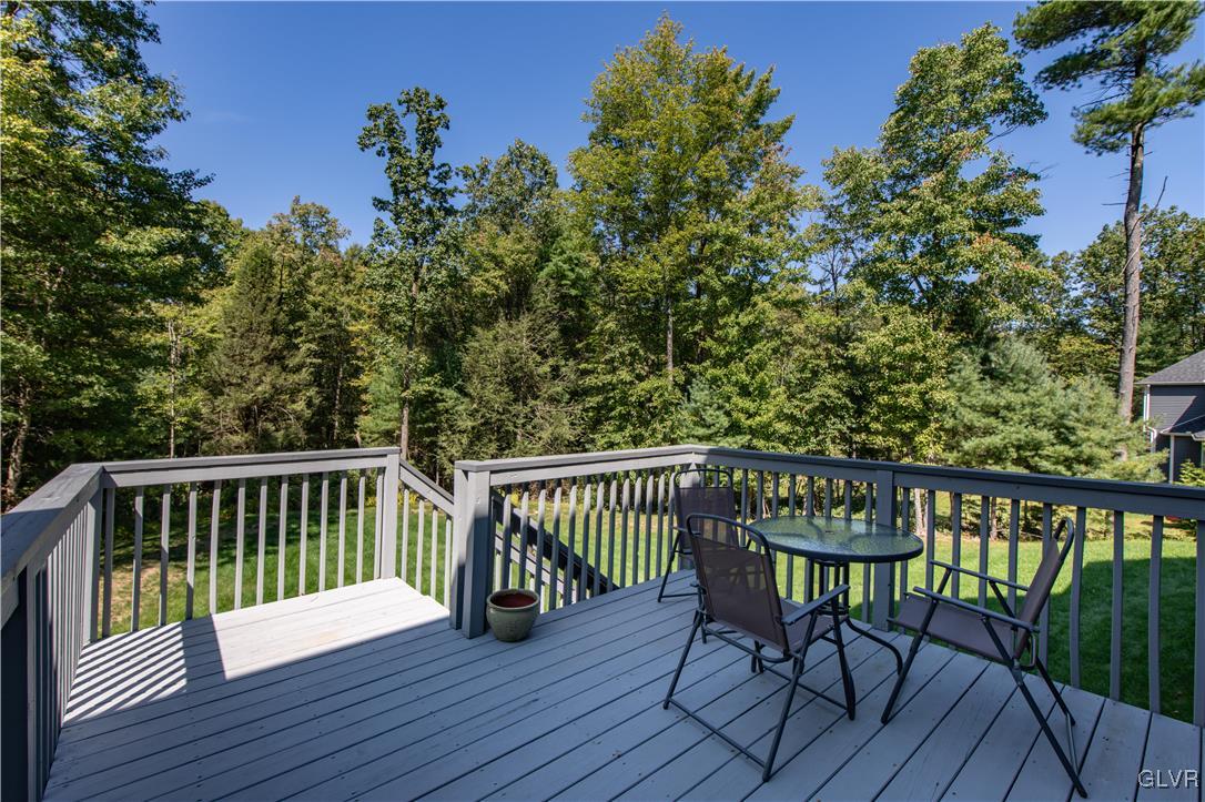 152 Corktree Road Kunkletown, PA 18058 - Photo 41 of 49 a view of a wooden deck with a bench