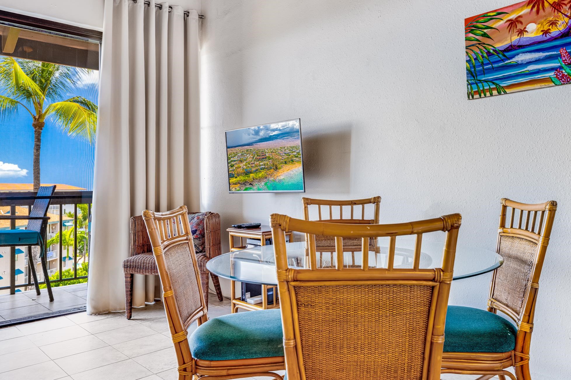 2191 South Kihei Road, Unit 3402 Kihei, HI 96753 - Photo 11 of 50 a view of a dining room with furniture and a floor to ceiling window