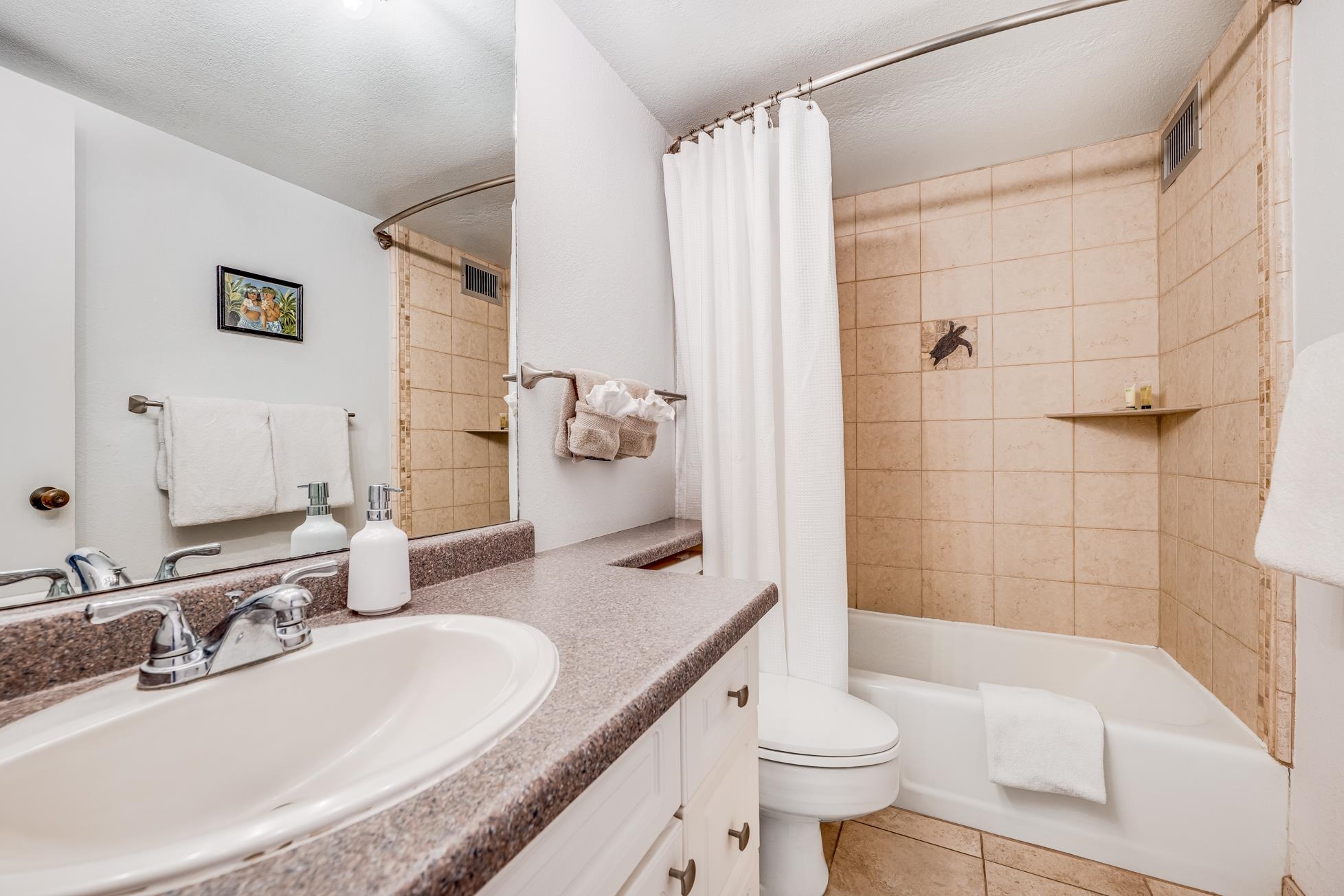 2191 South Kihei Road, Unit 3402 Kihei, HI 96753 - Photo 19 of 50 a bathroom with a sink and toilet