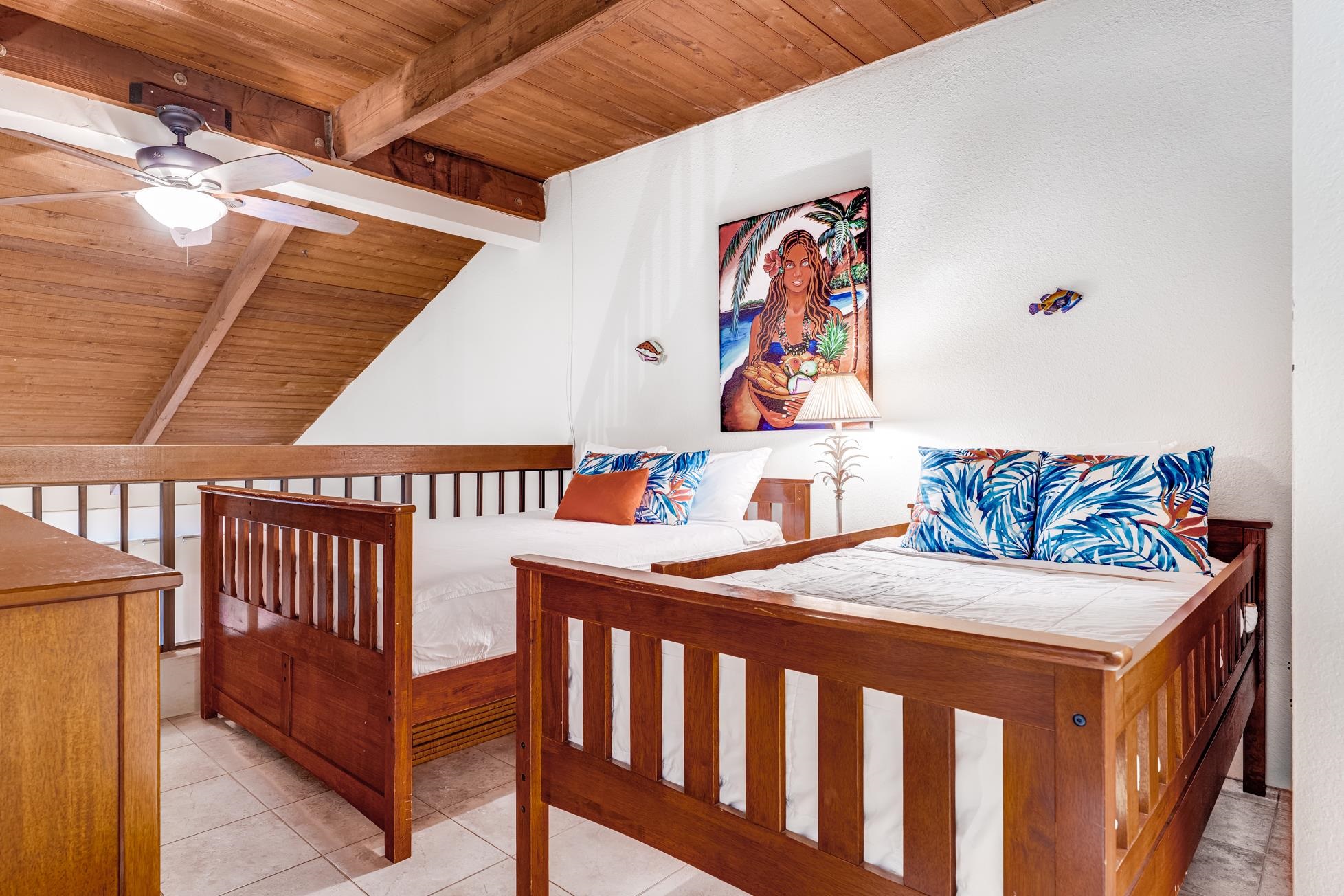 2191 South Kihei Road, Unit 3402 Kihei, HI 96753 - Photo 25 of 50 a bedroom with a bed and a table