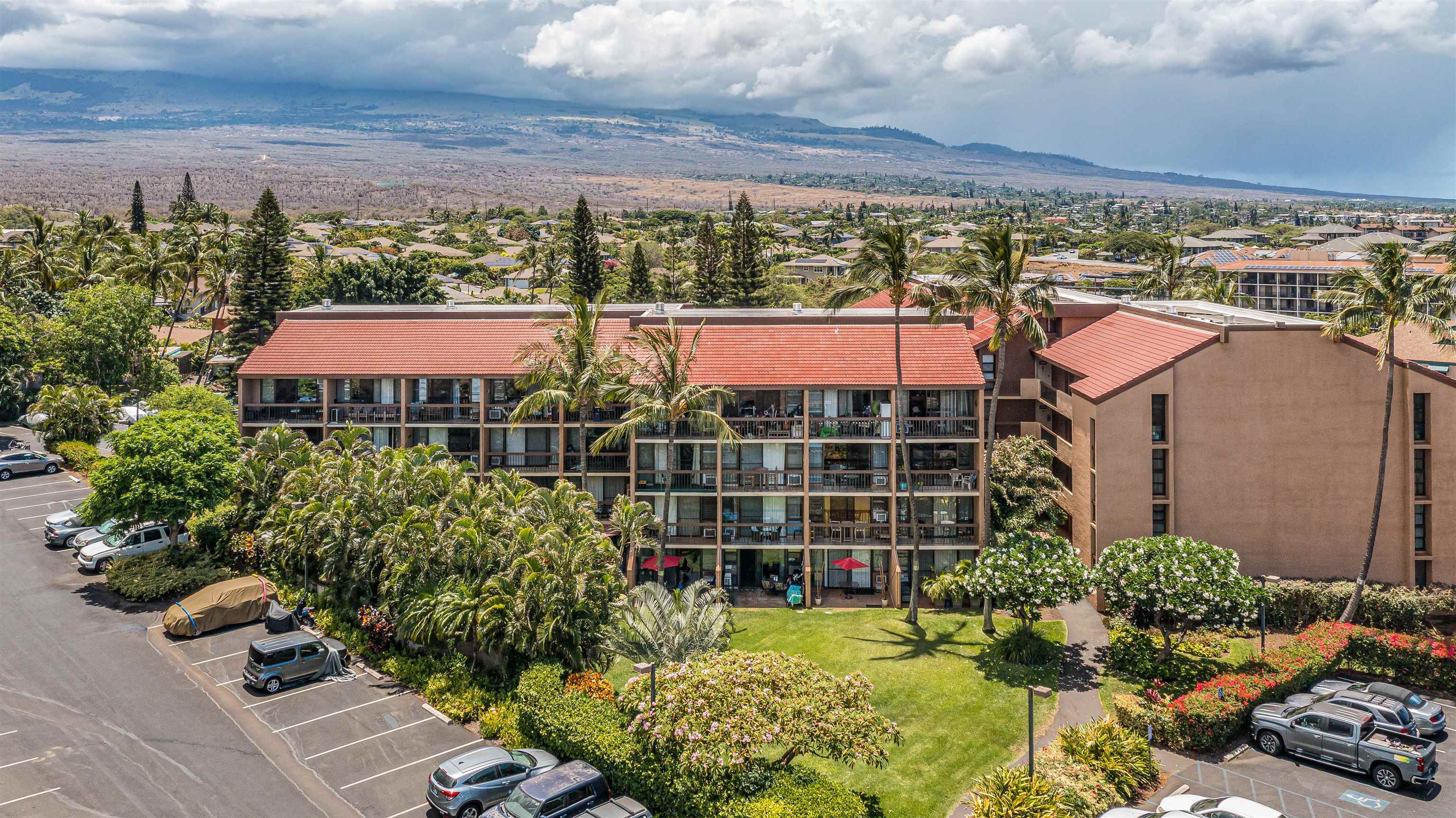 2191 South Kihei Road, Unit 3402 Kihei, HI 96753 - Photo 39 of 50 a view of a city with flower plants in front of main door
